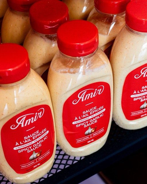 Amir food photography showing a side of hummus.